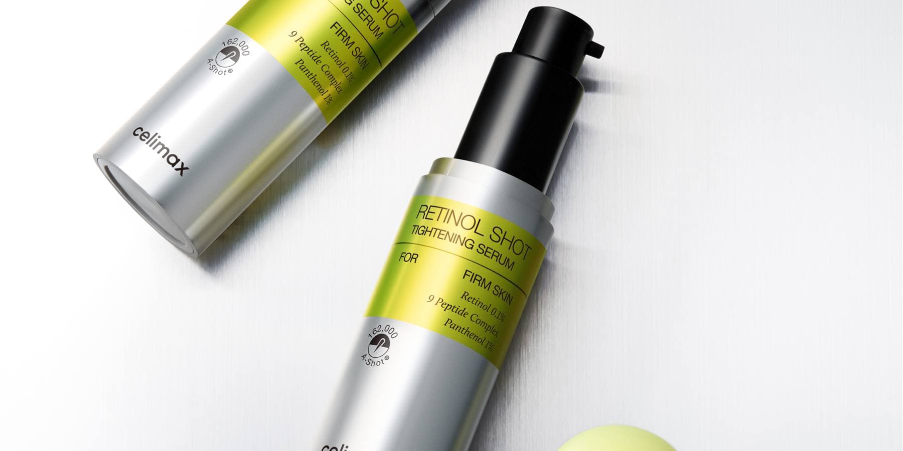 celimax The Vita A Retinol Shot Tightening Serum — two silver bottles with lime labels reading Retinol 0.1%, 9 Peptide Complex, Panthenol 1%